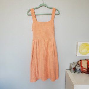 Anthropologie coral colored dress